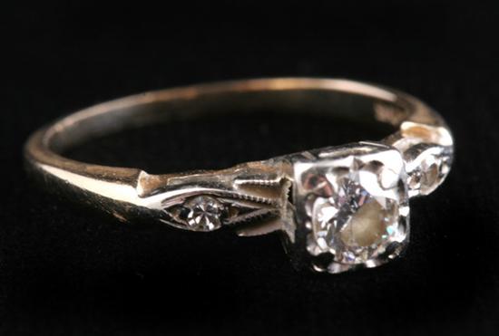 Appraisal: K YELLOW AND WHITE GOLD AND DIAMOND ENGAGEMENT-TYPE RING Early