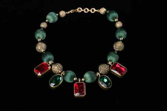 Appraisal: YVES SAINT LAURENT NECKLACE s Comprising deep green silk beads