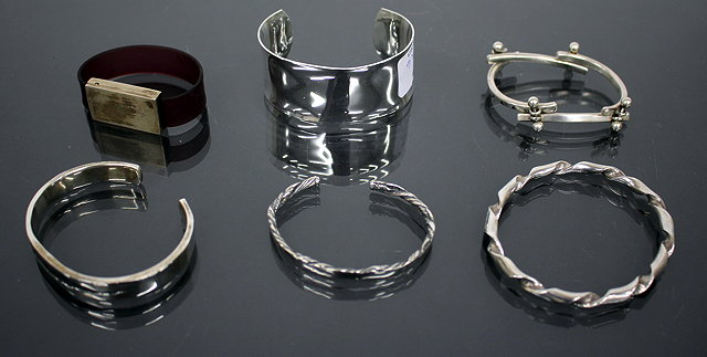 Appraisal: FOUR SILVER CHAIN LINK BRACELETS and further bangles and bracelets