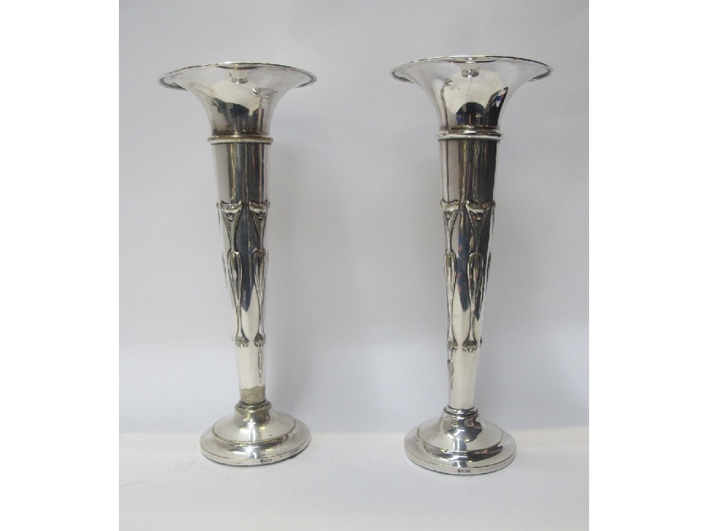 Appraisal: A pair of Art Nouveau silver plated trumpet vases decorated