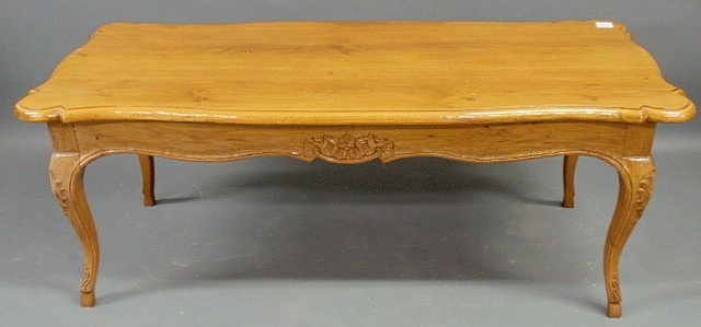 Appraisal: French Provincial style blonde wood coffee table h x w