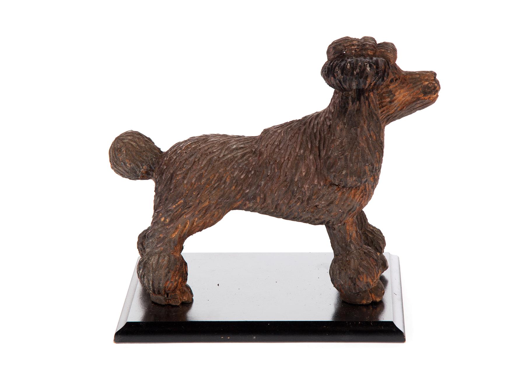 Appraisal: AMERICAN POODLE CARVING Twentieth century Natural solid wood remounted on