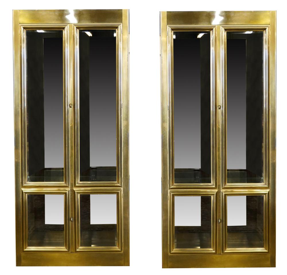 Appraisal: PAIR OF MASTERCRAFT VITRINE CABINETSbrass-clad wood and glass Condition each