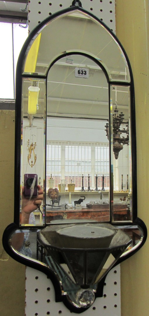 Appraisal: An Art Deco bevelled glass arch top wall mirror with