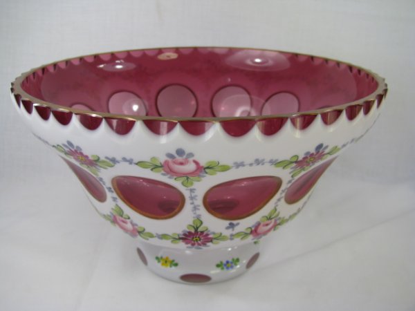 Appraisal: Bohemian cranberry cased glass bowl with hand painted floral design