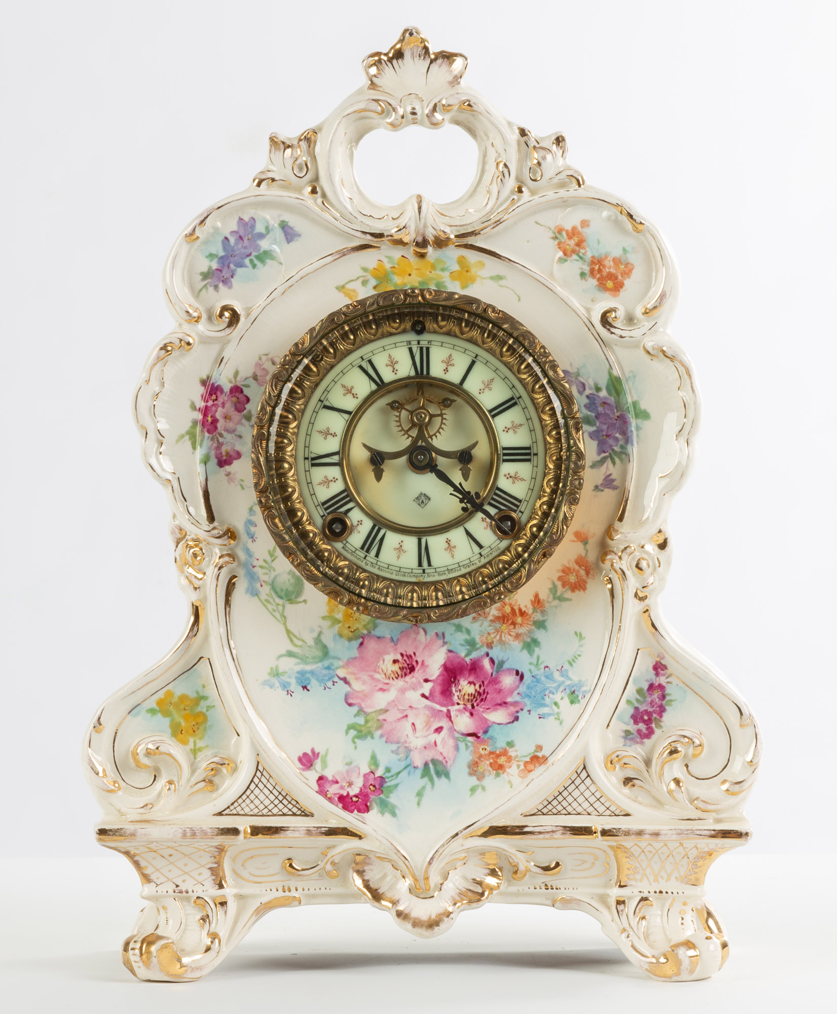 Appraisal: ANSONIA ROYAL BONN CHINA SHELF CLOCK th century Porcelain dial