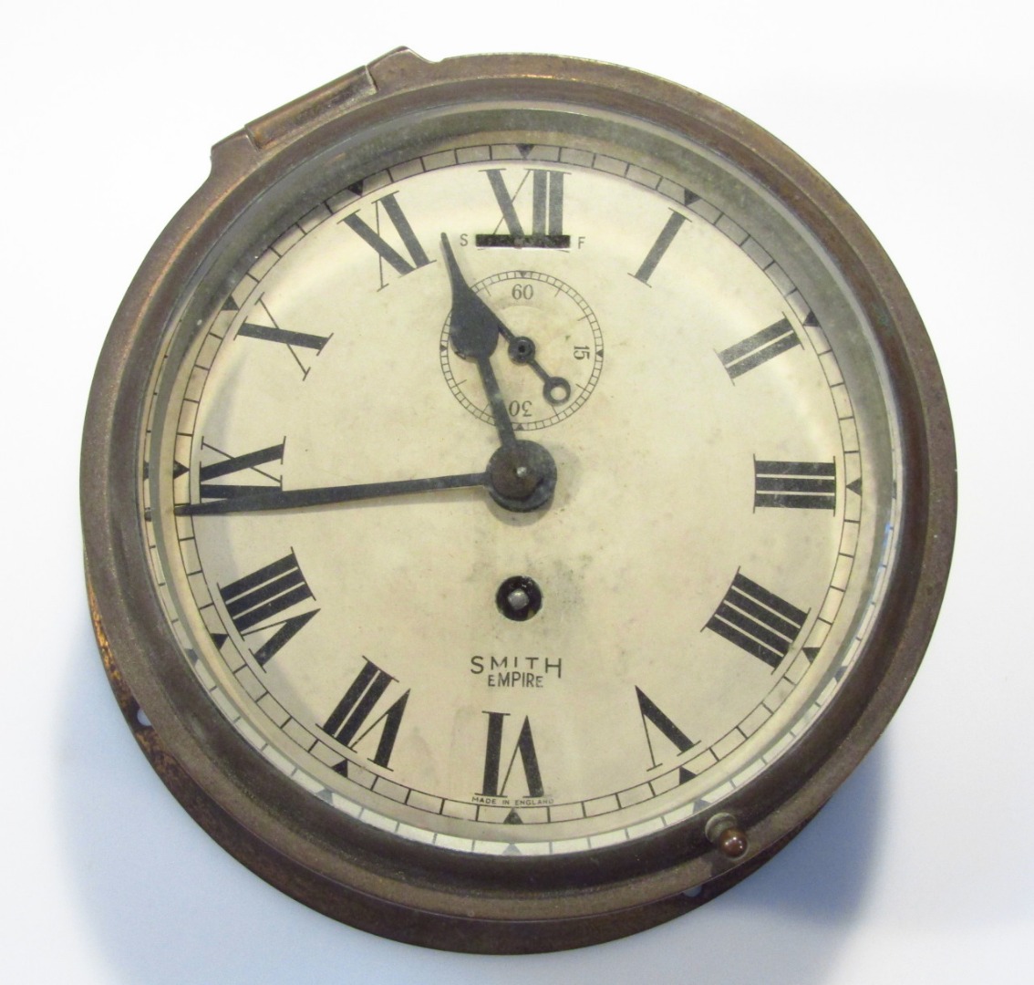 Appraisal: An early thC Smith Empire bulkhead clock with cm dia