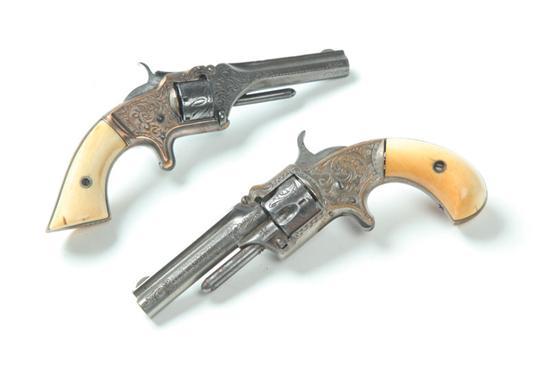 Appraisal: TWO ENGRAVED REVOLVERS WITH IVORY GRIPS American th century Smith