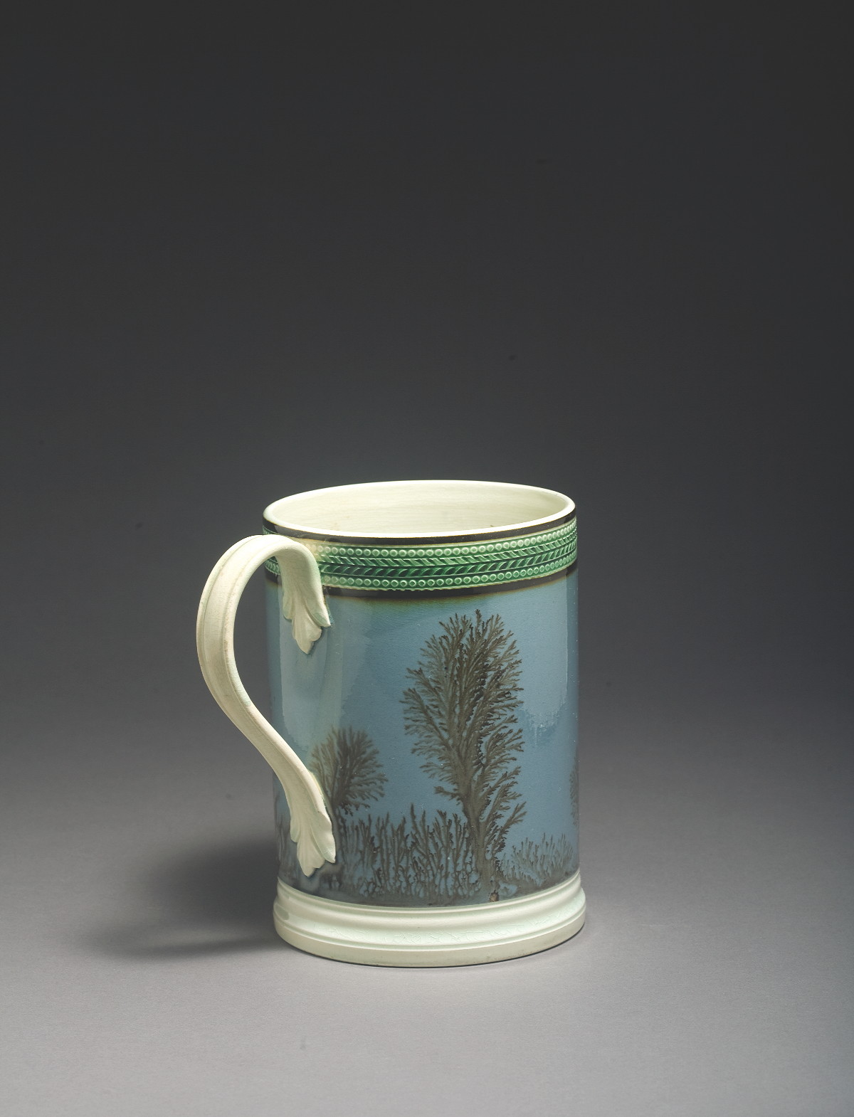 Appraisal: BRITISH PEARLWARE MOCHAWARE QUART MUG CIRCA Surrounded by dendritic trees