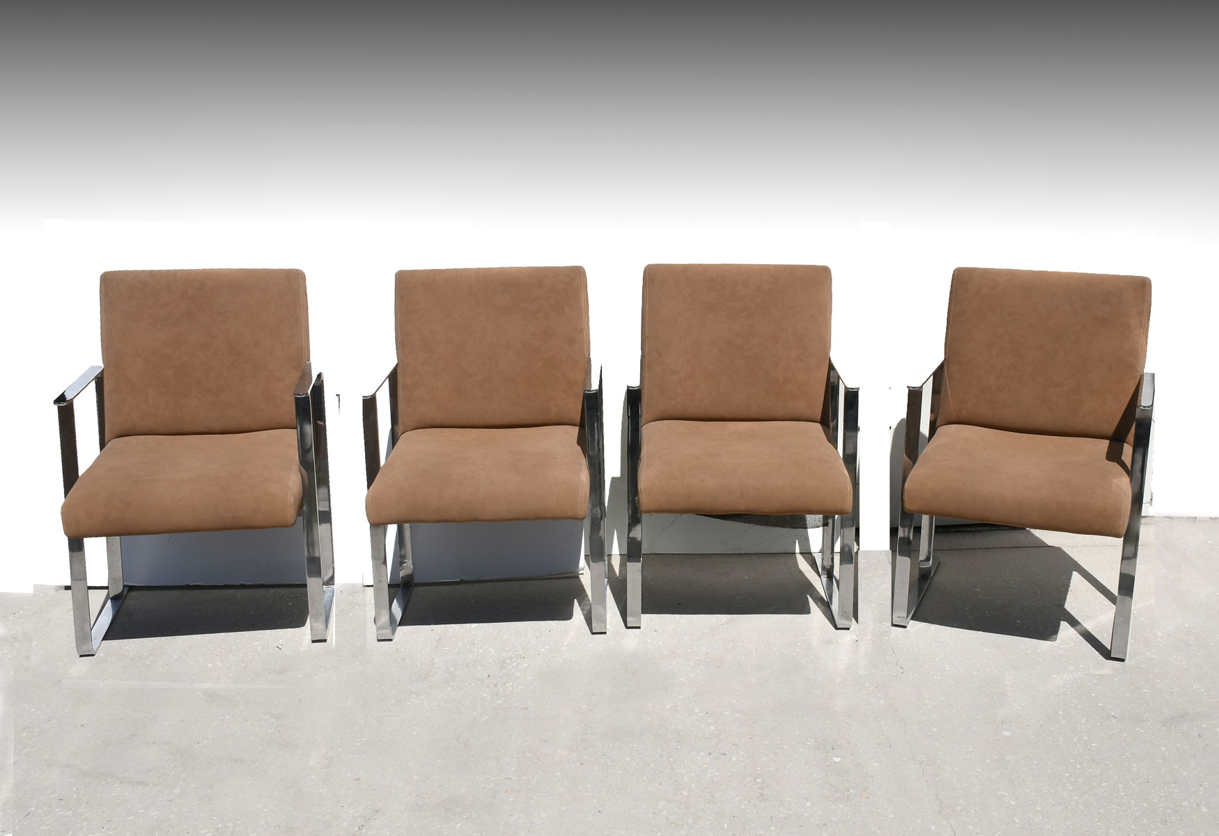 Appraisal: MILO BAUGHMAN CHROMED ARMCHAIRS Set of Milo Baughman Mid-century modern