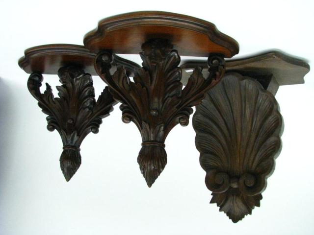 Appraisal: Group of three carved wooden wall shelves mahogany all th