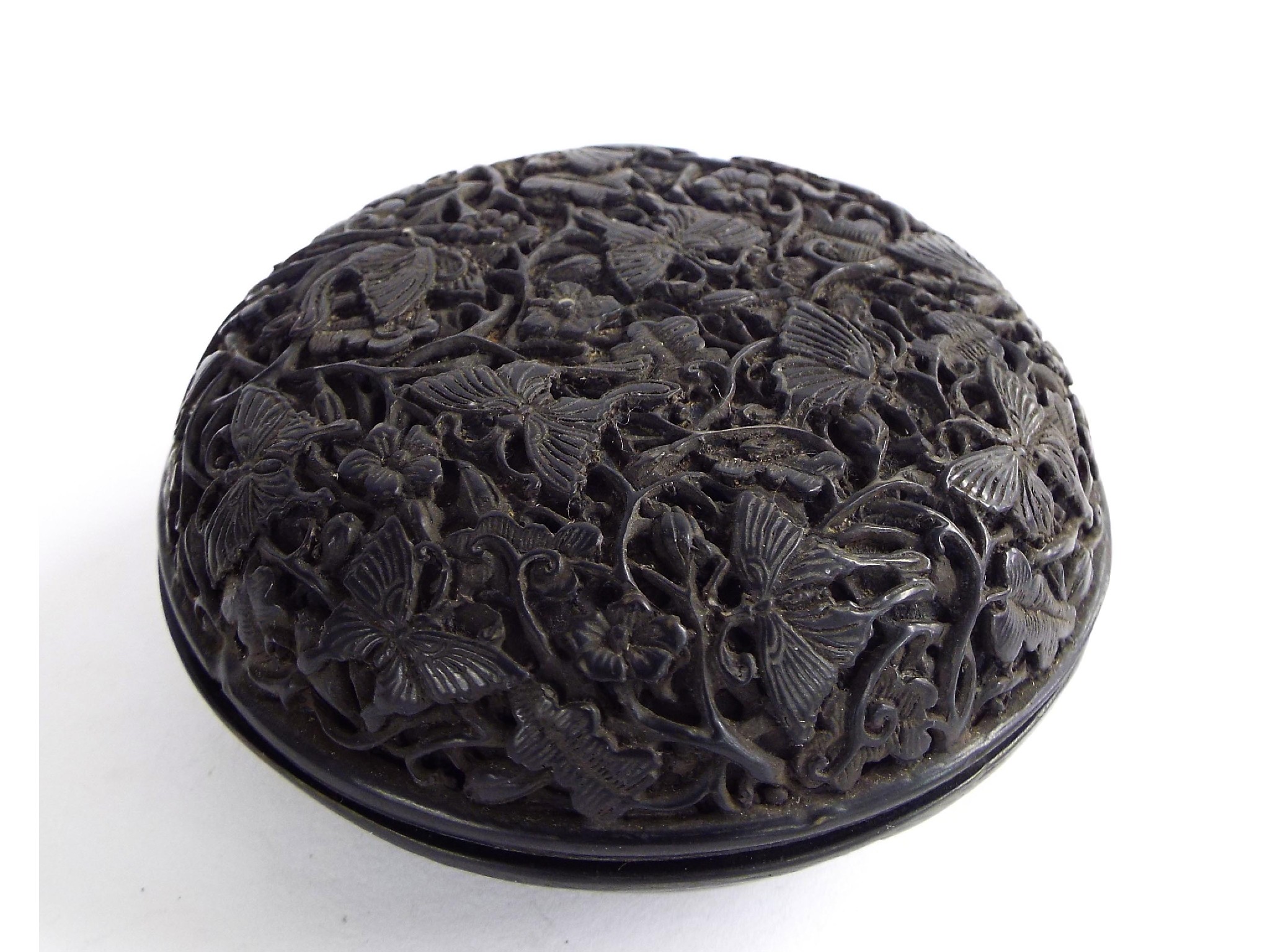 Appraisal: Chinese black cinibar circular box the lid decorated with butterflies