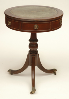 Appraisal: A REGENCY STYLE LEATHER INSET DRUM TABLE