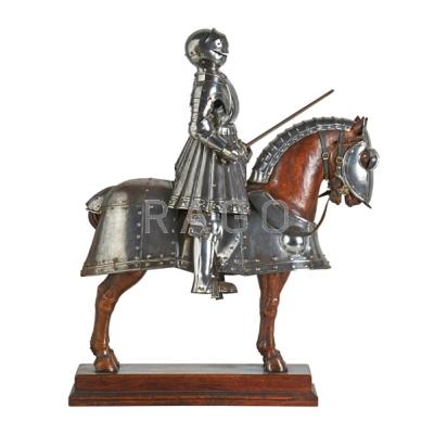 Appraisal: MINIATURE SUIT OF ARMOR Knight astride a carved wood horse