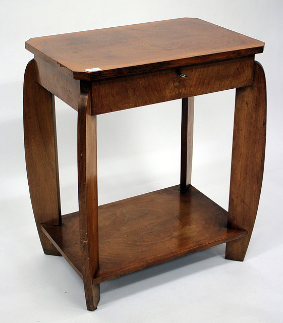 Appraisal: AN ART DECO WALNUT OCCASIONAL TABLE the box top with