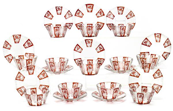 Appraisal: A set of twelve Bohemian etched ruby and clear glass