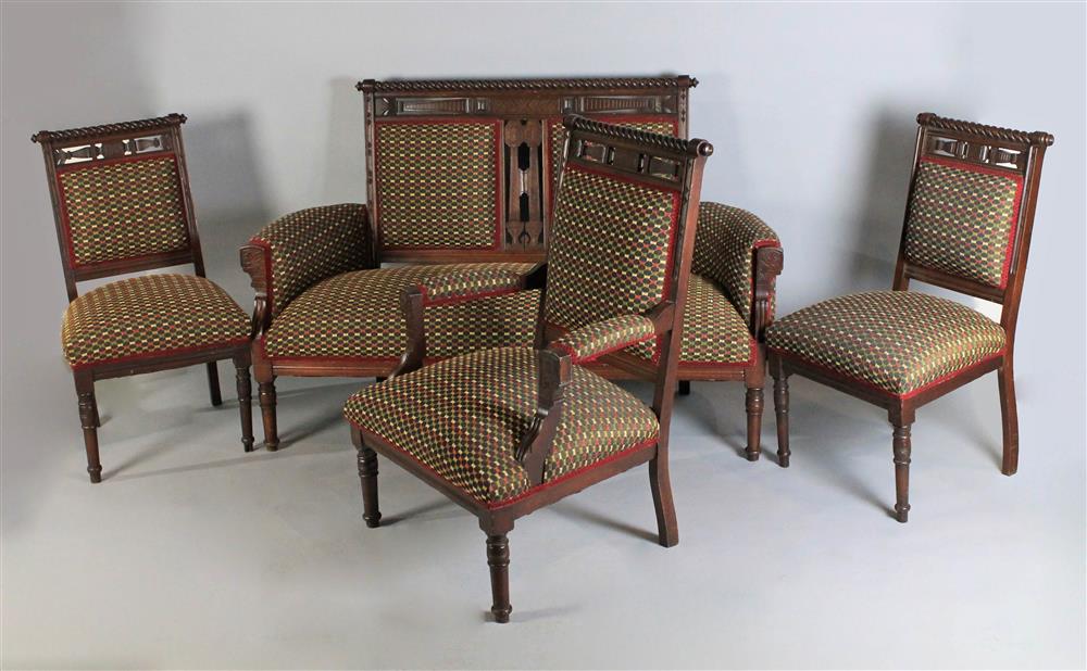 Appraisal: EASTLAKE CHERRY PARLOUR SUITE INCLUDING AN UPHOLSTERED SETTEE AN ARMCHAIR