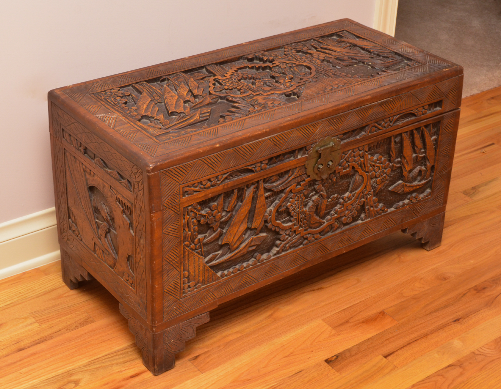 Appraisal: CHINESE CARVED CAMPHOR BLANKET CHEST Oriental genre scene motifs carved