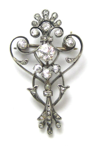 Appraisal: VICTORIAN DIAMOND FOURTEEN WHITE GOLD BROOCH featuring a round-cut diamond