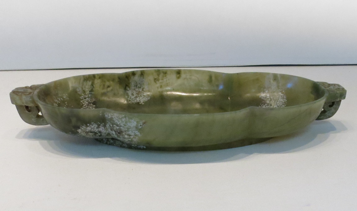 Appraisal: CHINESE CARVED ARCHAIC JADE SHALLOW BOWL an oblong shape with