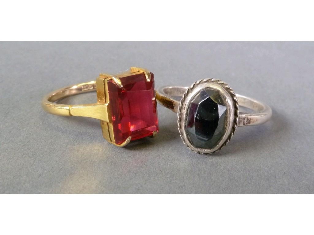 Appraisal: ct GOLD RING claw set with an oblong red rubellete