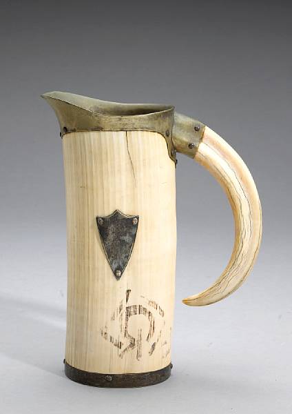 Appraisal: A silverplate mounted ivory pitcher early th century Of naturalistic