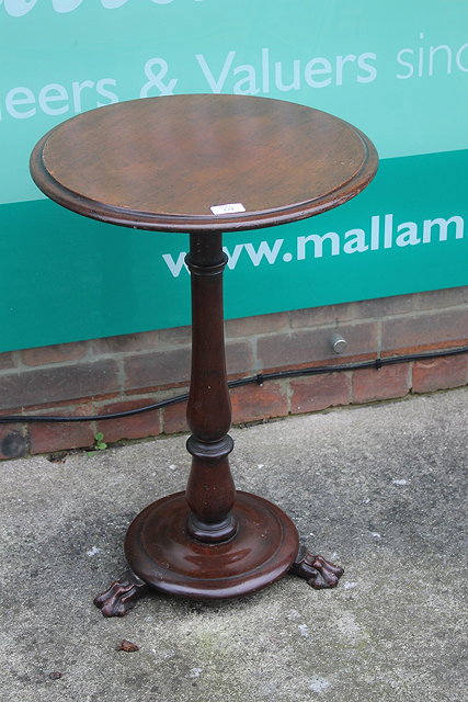 Appraisal: A VICTORIAN MAHOGANY PEDESTAL TABLE the circular top on turned