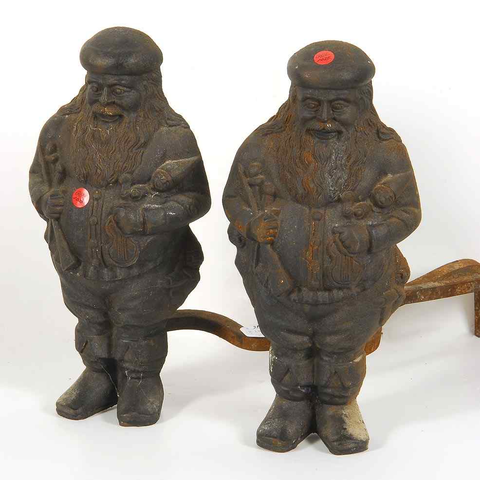 Appraisal: PAIR OF CAST IRON SANTA CLAUS ANDIRONSSecond Half of the