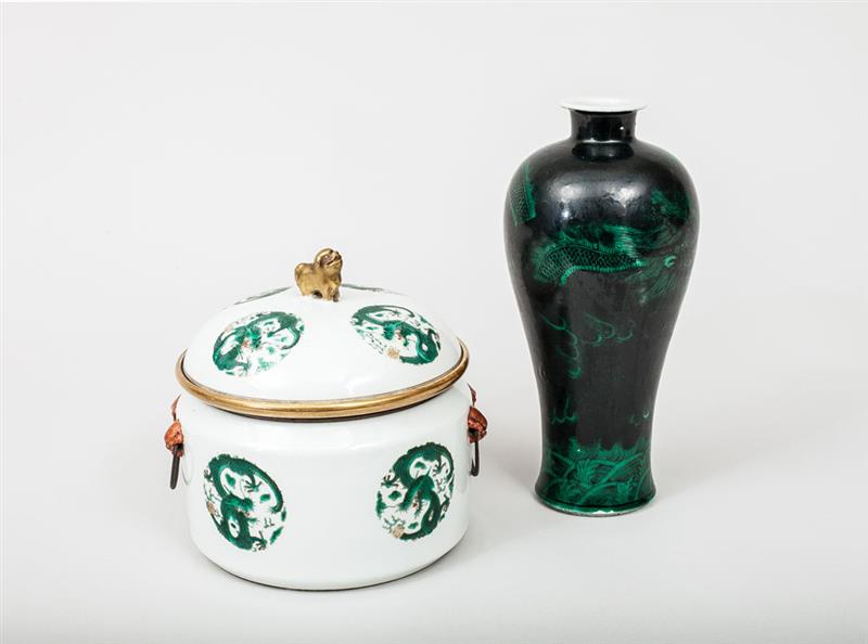 Appraisal: Chinese Porcelain Black-Ground Vase Painted with green dragon and wave