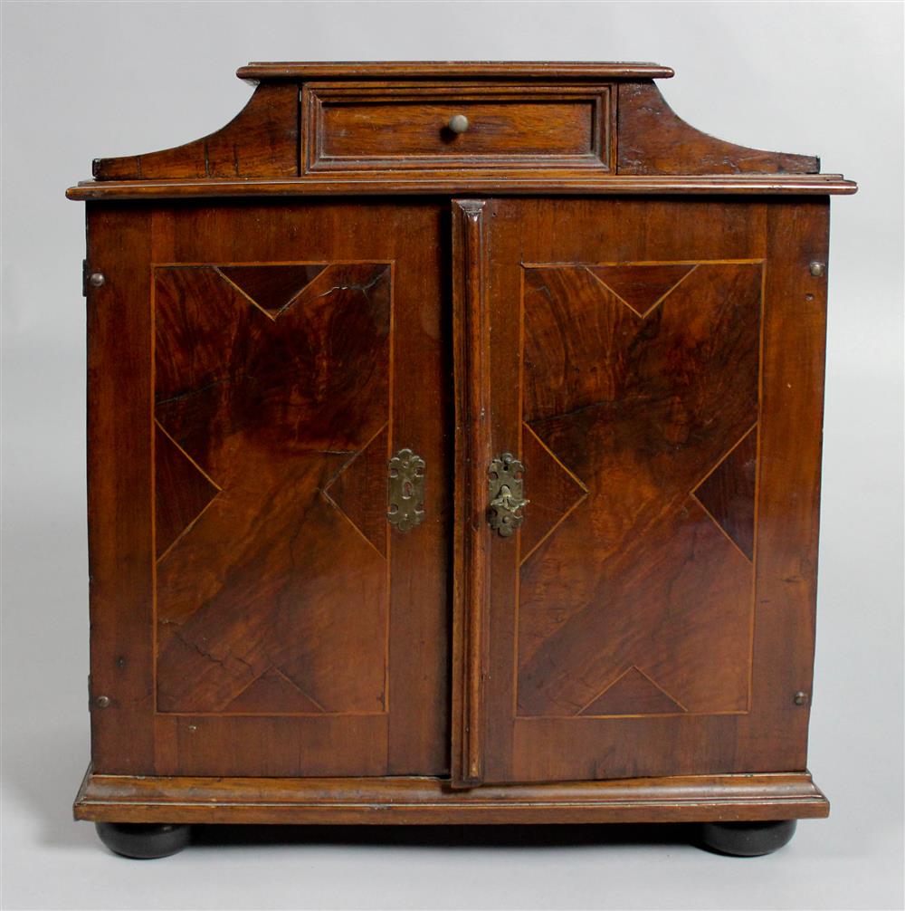 Appraisal: ENGLISH REGENCY INLAID MAHOGANY DESK TOP CABINET having a shaped