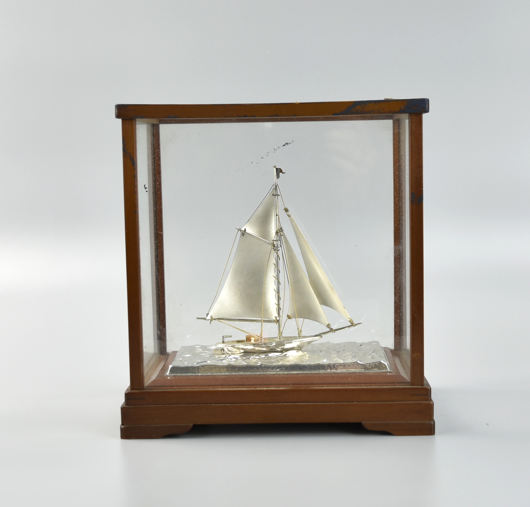 Appraisal: A JAPANESE STERLING SILVER SAILBOAT IN SHOWCASE A Japanese silver