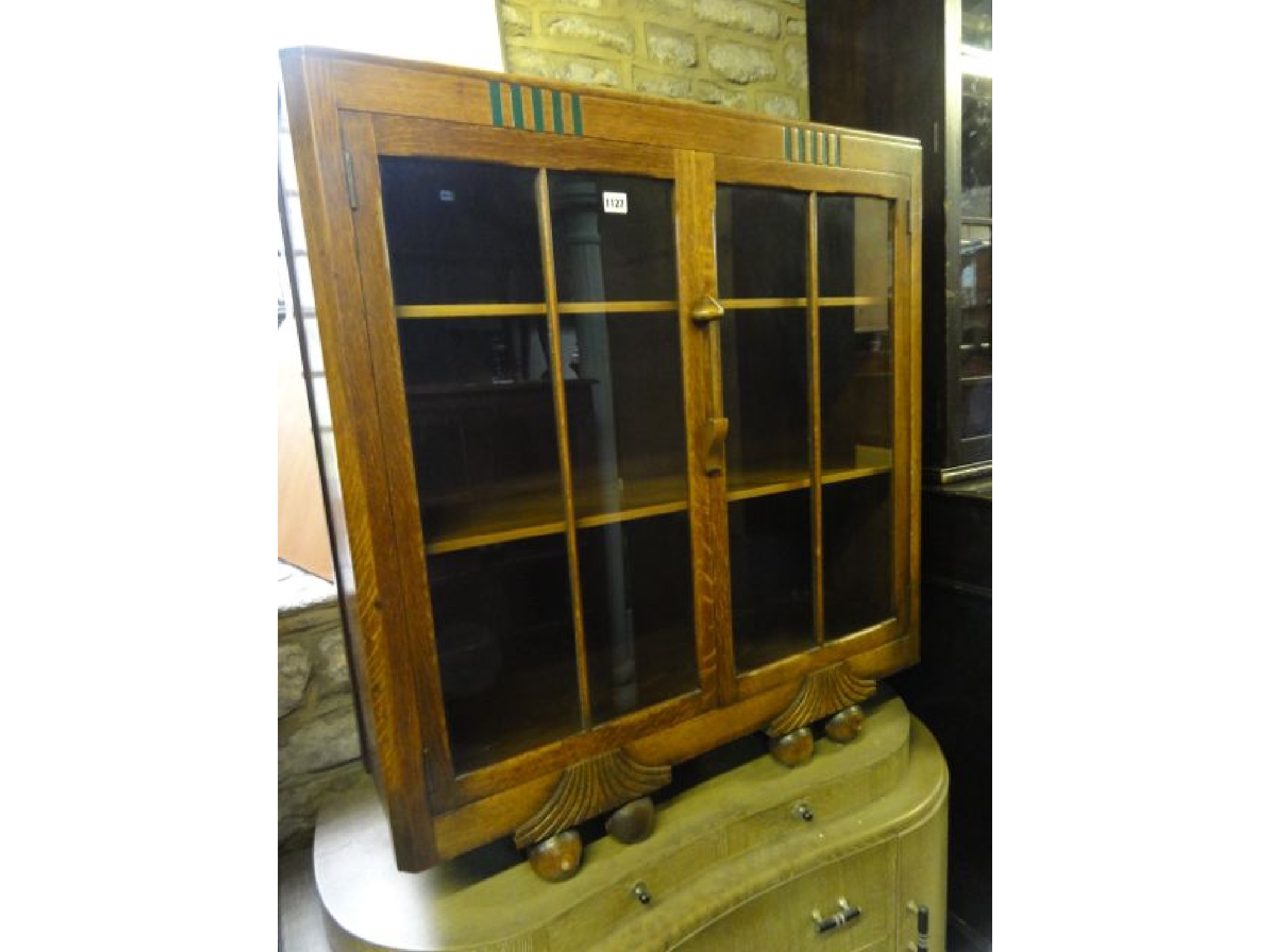 Appraisal: A s Art Deco style oak side cabinet enclosed by