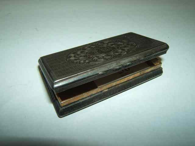 Appraisal: A VICTORIAN SILVER SNUFF BOX of waisted rectangular form with