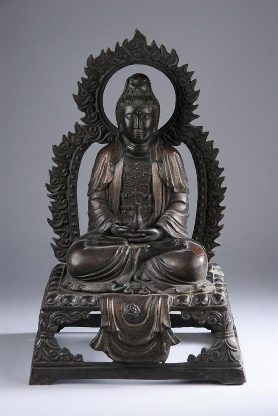 Appraisal: CHINESE BRONZE FIGURE OF GUANYIN Xuande six-character mark Seated in