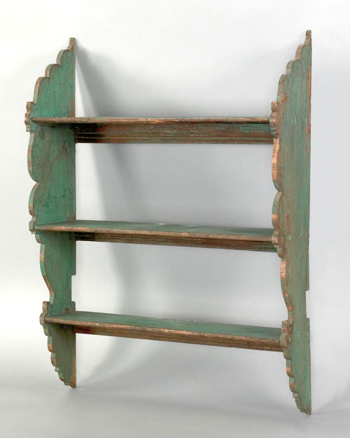 Appraisal: Pennsylvania painted hanging shelf th c with scalloped sides retaining