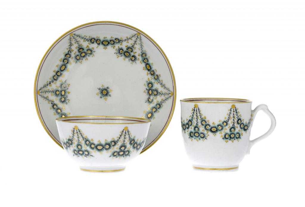 Appraisal: A NEW HALL TRIO enamelled in green and gilt with