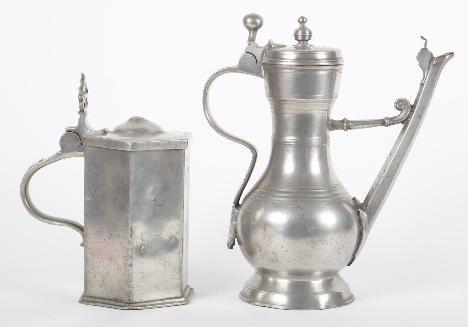 Appraisal: German pewter coffee pot and flagon Arabic style coffee pot