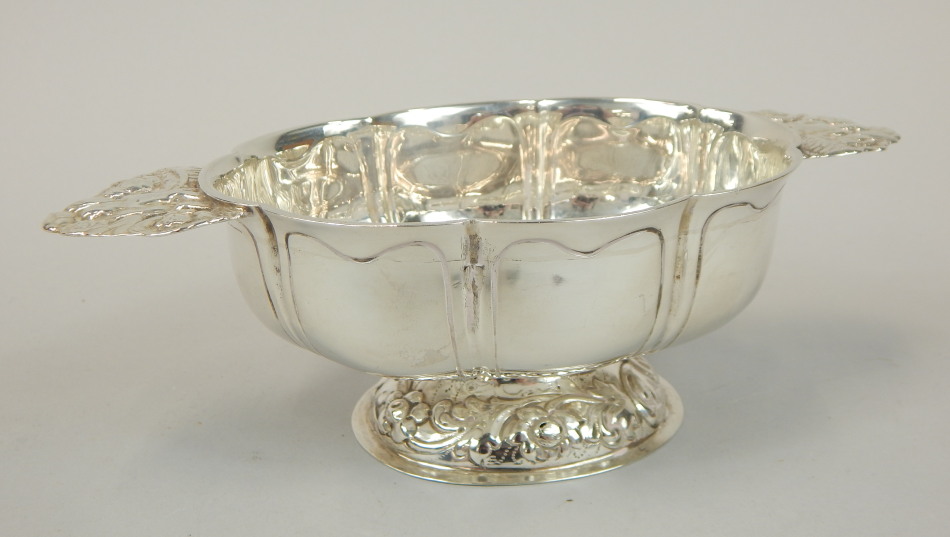 Appraisal: An Edwardian silver two handled drinking vessel in Arts and