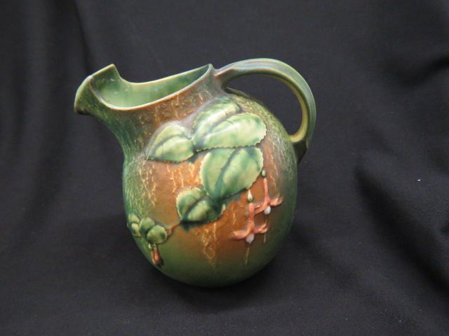 Appraisal: Roseville Pottery Fuschia Water Pitcher green ice lip excellent