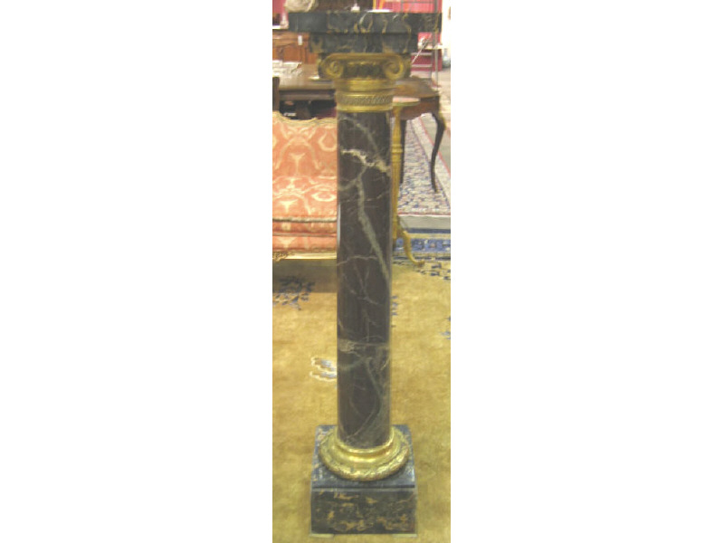 Appraisal: CONTINENTAL BLACK MARBLE AND ORMOLU PEDESTAL Square top above the