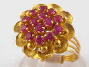 Appraisal: An carat gold ring of floral design set with red