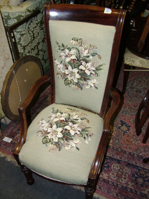 Appraisal: A mahogany floral tapestry upholstered open armchair together with a