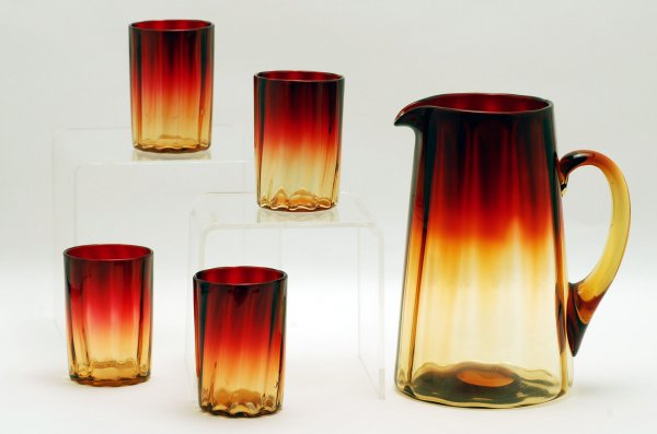 Appraisal: Victorian Amberina water set comprised of tapered and internally ribbed