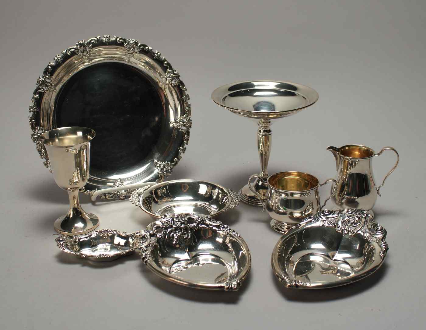 Appraisal: NINE PIECES OF STERLING SILVER HOLLOWWAREBy various makers Includes a