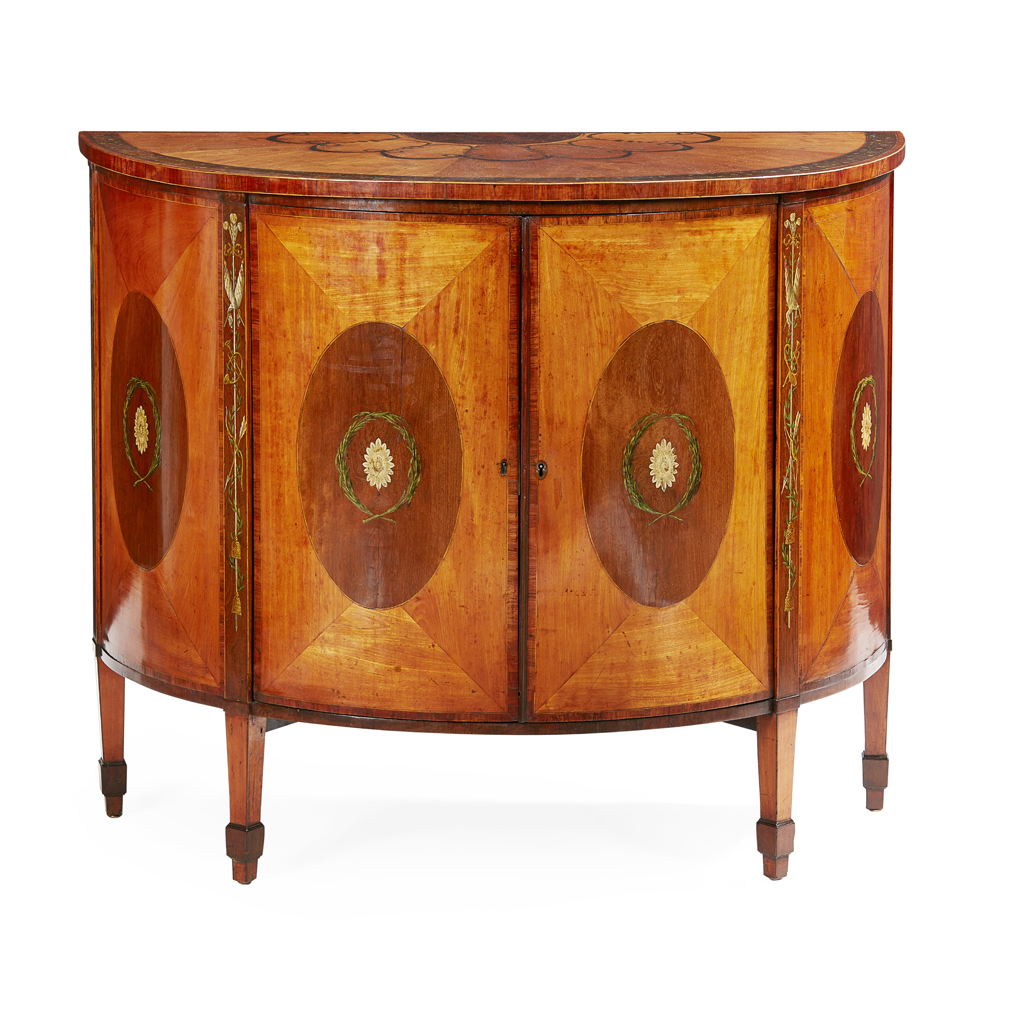 Appraisal: LATE GEORGE III SATINWOOD HAREWOOD MAHOGANY AMBOYNA POLYCHROME DEMILUNE COMMODE