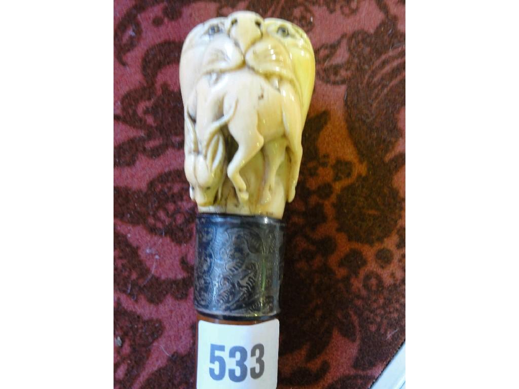 Appraisal: A gentleman's walking cane with a carved ivory lion head