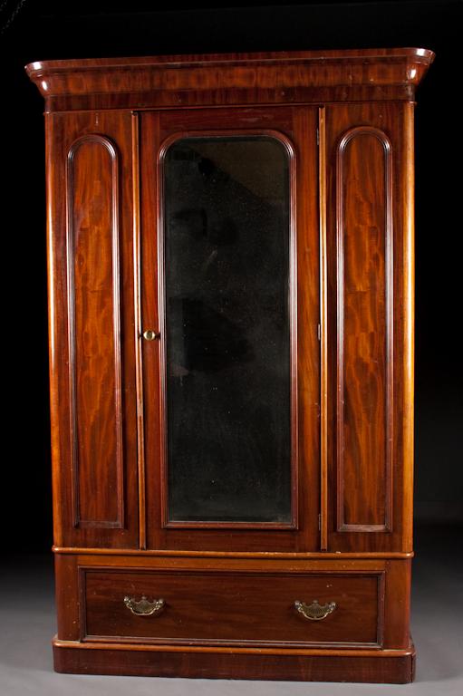 Appraisal: Victorian mahogany wardrobe circa with mirrored door panel in H