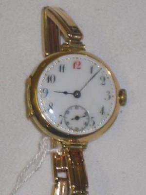 Appraisal: A ROLEX CT GOLD LADY'S WATCH the white enamel dial