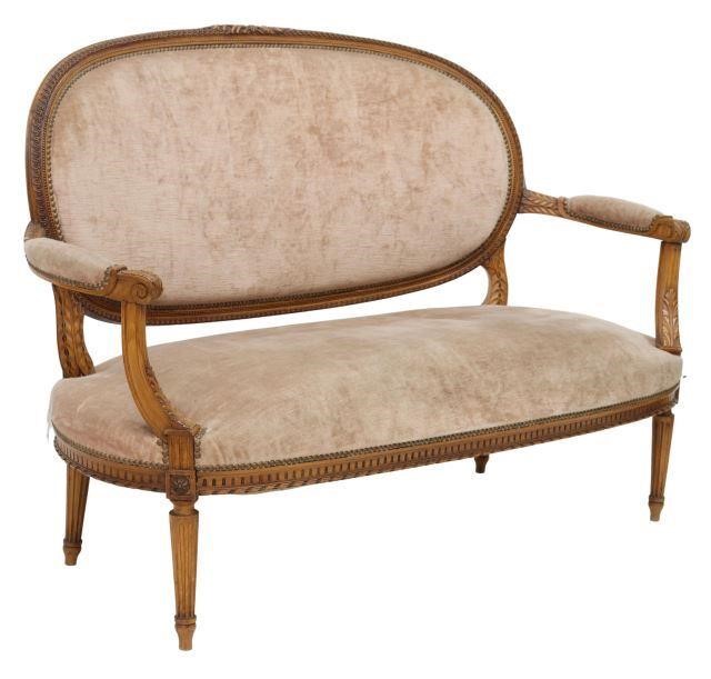 Appraisal: French Louis XVI style walnut salon settee sofa early th