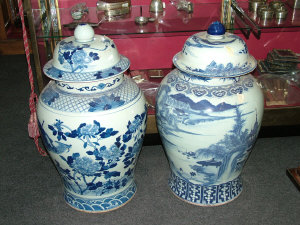 Appraisal: Two modern Chinese blue and white baluster vases and covers